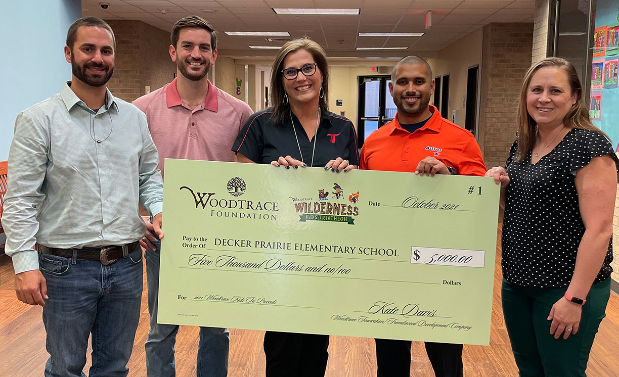 Friendswood Development Company’s Woodtrace Wilderness Kids Triathlon Makes $5,000 Donation to Tomball ISD’s Decker Prairie Elementary School